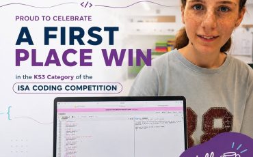 EIFA A girl stands smiling in a classroom beside a laptop displaying code. Text congratulates her for winning first place in the KS3 category of the ISA Coding Competition. Logos of ISA and EIFA International School are present.
