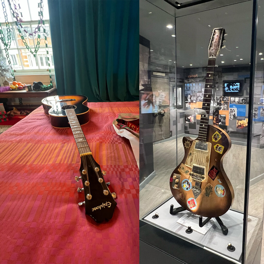 EIFA À gauche : une guitare acoustique Epiphone posée sur un lit recouvert dune housse à rayures roses et oranges, près dune fenêtre. À droite : une guitare électrique exposée dans une vitrine en verre ornée de divers autocollants, dans le cadre dune exposition au musée EIFA de Londres.