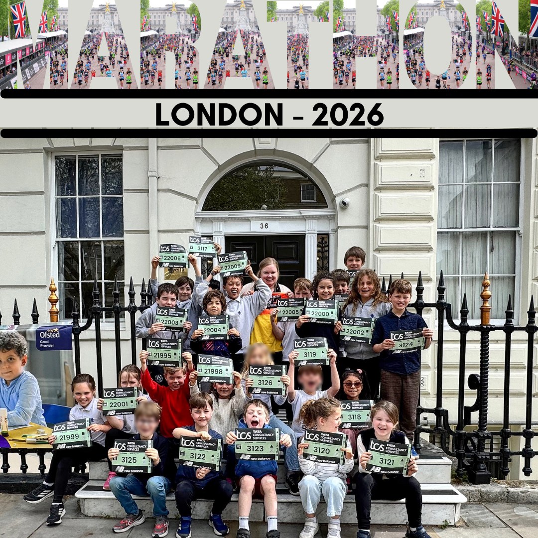 EIFA A group of children and adults pose outside a building, each holding a London 2026 marathon race bib. Above them, MARATHON and LONDON - 2026 are displayed in large, colorful letters for International Open Day.