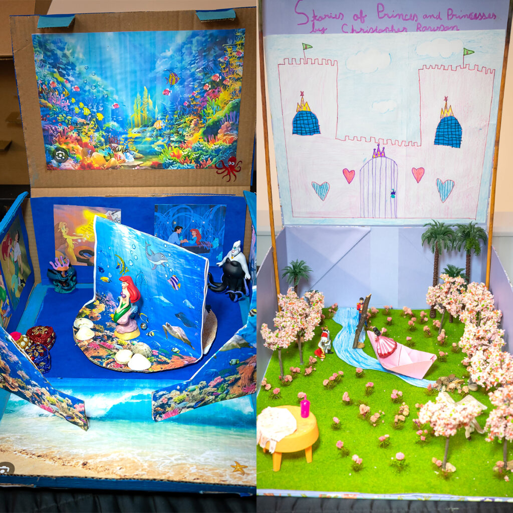EIFA À gauche : un diorama 3D coloré représentant une sirène, des poissons et une scène sous-marine. À droite : un diorama artisanal intitulé « Histoires de princes et de princesses », représentant un prince et une princesse dans un jardin avec un château en arrière-plan et des cerisiers en fleurs.